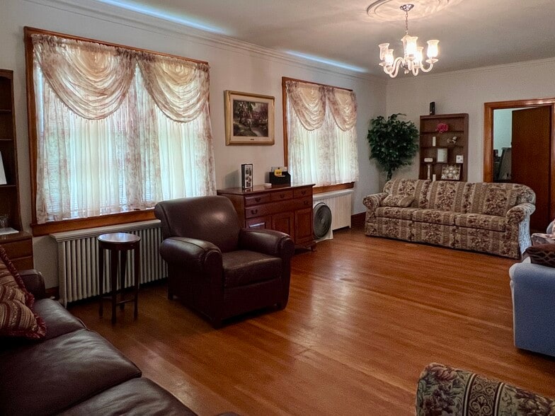 Living room. Shared. Board games and Monopoly table. - 209 Main St