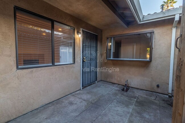 Building Photo - 7409 Village Green Dr