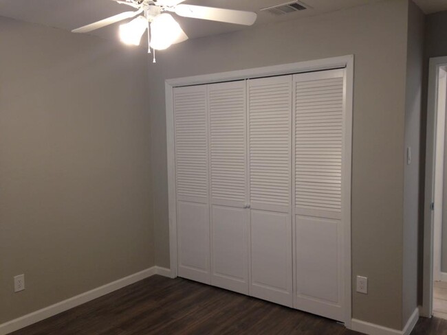 Guest bedroom has a full size closet with awesome built-ins! - 11401 Ptarmigan Dr