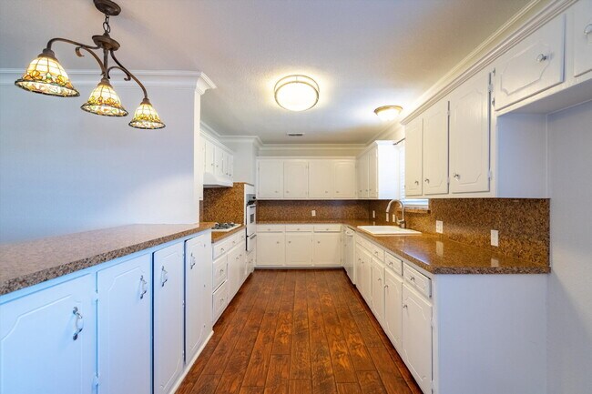 Building Photo - Move in special: $1,000 off your first month with an 18 month lease.