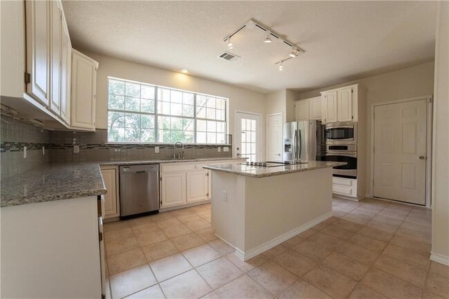 Building Photo - 1701 Idle Hour Cove