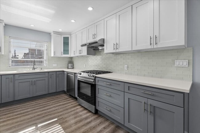 Building Photo - Updated Three Level Arcadia Townhome with Private Yard and Attached Garage