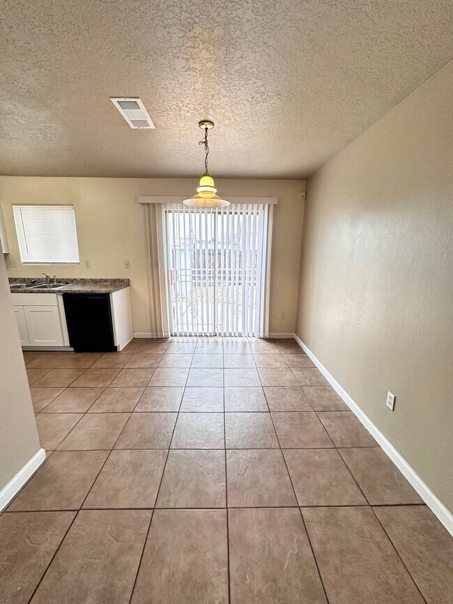 Building Photo - 3 Bedroom 2 Bathroom with 2 Car Garage