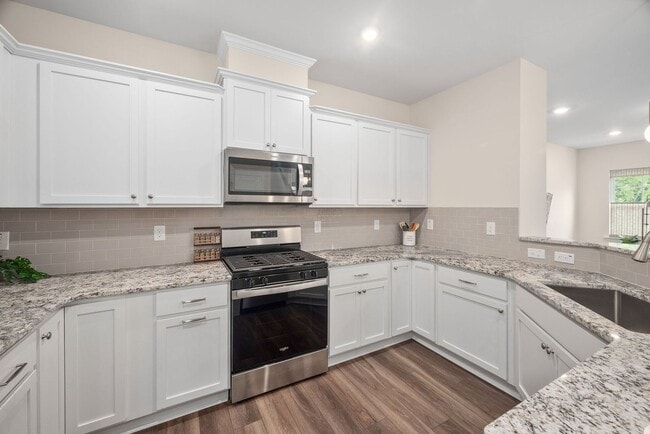 Building Photo - Stunning 3BD, 2.5BA End-Unit Fuquay-Varina Townhome with a 2-Car Garage in a Prime Location Near ...