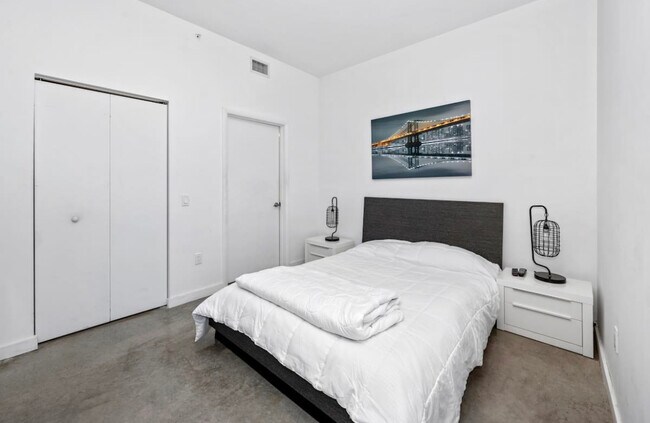 Bedroom, bathroom, closet all you need in one space - 151 SE 1st St