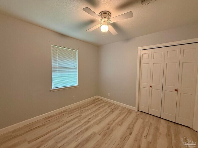 Building Photo - 9681 Pine Cone Dr