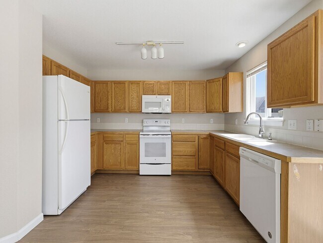 Building Photo - Recently Refreshed 3 Bed, 2.5 Bath Duplex with Fenced Yard — Available Now in Evans, CO!