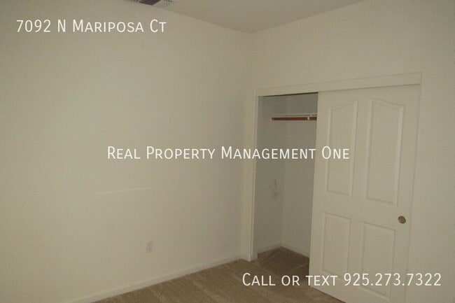 Building Photo - 7092 N Mariposa Ct