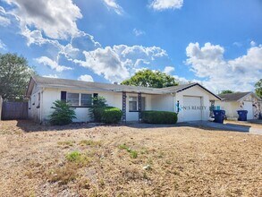 Building Photo - Beautiful 2/2/1 1150 Sq. Ft. with BONUS ROOM!!... tile & luxury plank flooring, Frest paint and a...