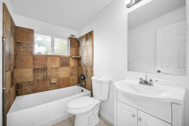 Building Photo - Spacious 4-Bedroom Layton Home with Finished Basement and 2-Car Garage