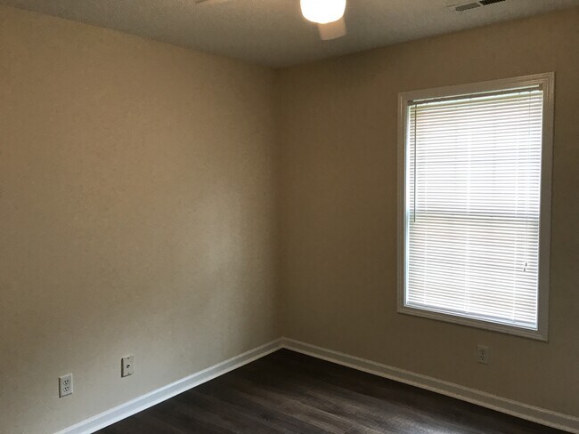 Building Photo - Available Now! Pet Friendly 3 Bedroom, 2 Bath Home with Garage and Fenced In Back Yard!