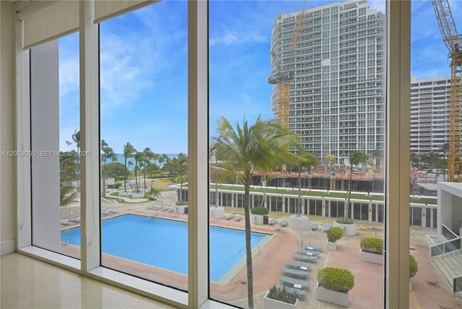 Building Photo - 10275 Collins Ave