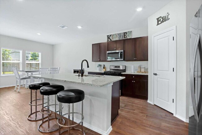 Building Photo - "Charming 4-Bedroom Retreat with Spacious ...