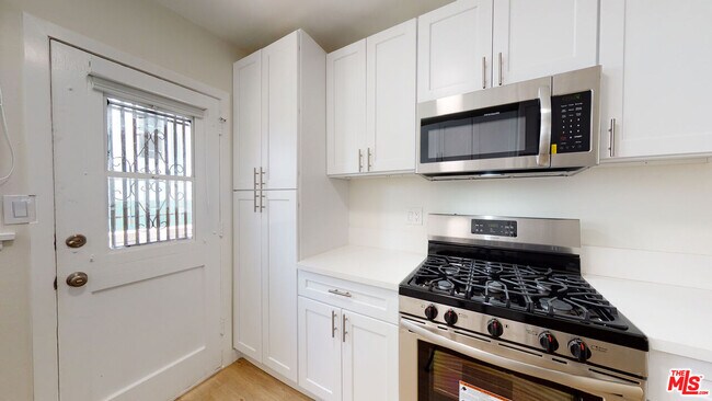 Building Photo - 8903 Harratt St