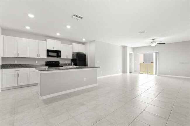 Building Photo - 10217 Summer Kiss Ave