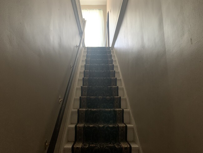 Stairs to 2nd floor - 255 N Van Buren St