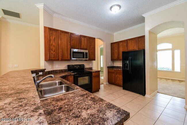 Building Photo - 7068 Rapid River Dr W