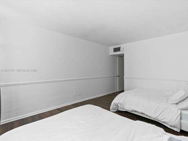 Building Photo - 5005 Collins Ave