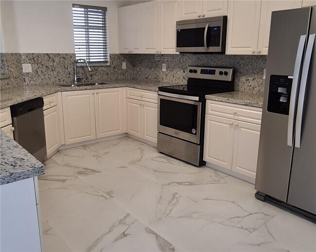 Building Photo - 7301 NW 173rd Dr