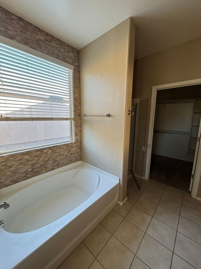 Building Photo - Spacious Gladden Farms Living: 4-Bed Retreat Near Parks & Trails