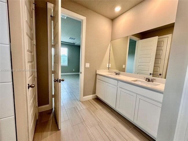 Building Photo - 9035 Dahlia Cir