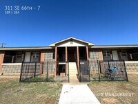 Building Photo - 311 SE 66th-7