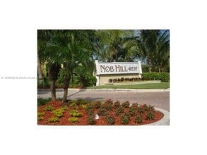 Building Photo - 10411 N Kendall Dr