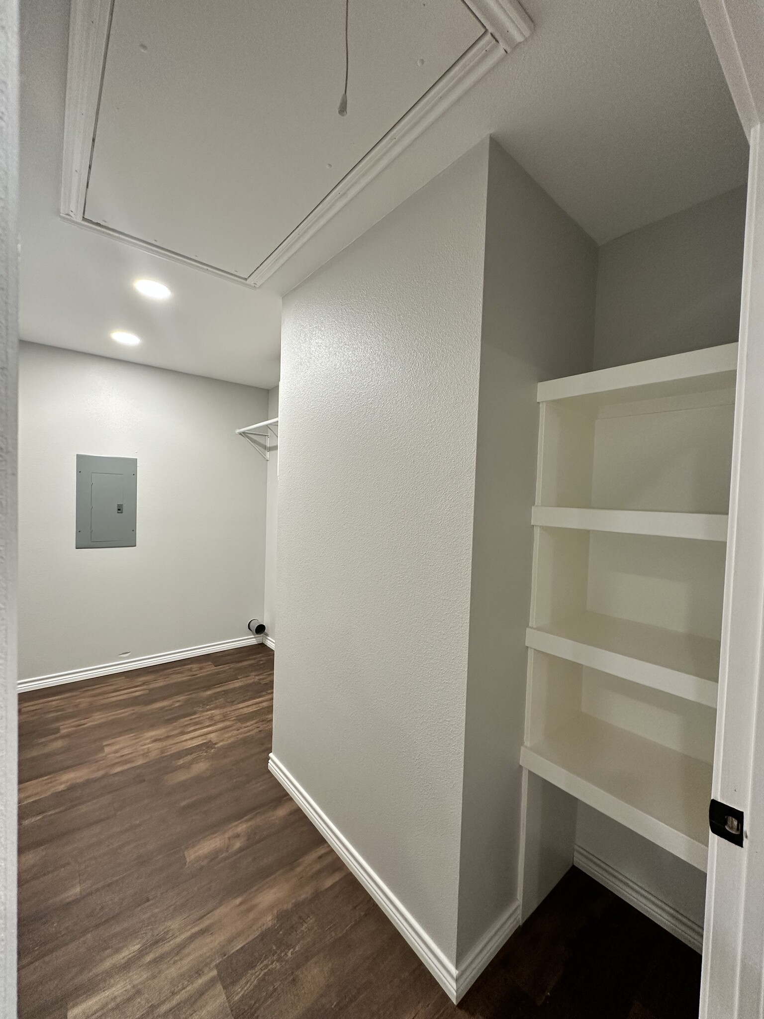 Utility Room with Washer/Dryer connections + Pantry - 107 S Bois D Arc St