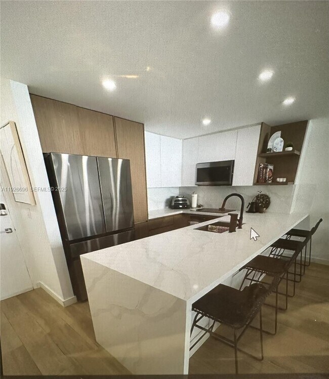 Building Photo - 5838 Collins Ave