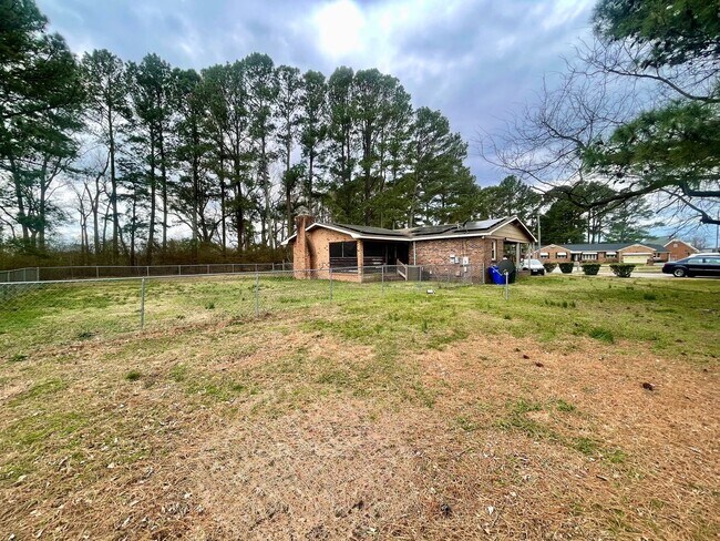 Building Photo - Spacious Home with Large Yard, Hot Tub, and More