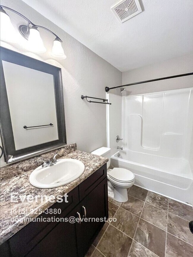 Building Photo - Spacious and Bright 4-Bedroom Home with Mo...