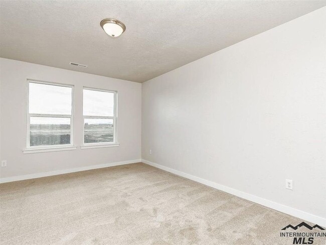 Building Photo - Charming 3 Bedroom Home in Nampa _ Pet Fri...