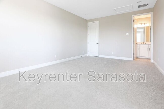 Building Photo - 6133 Lungo Lago Dr