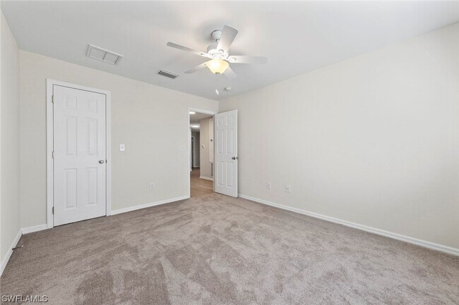 Building Photo - 4BR Home in Gated Town Lakes Community with Lake View