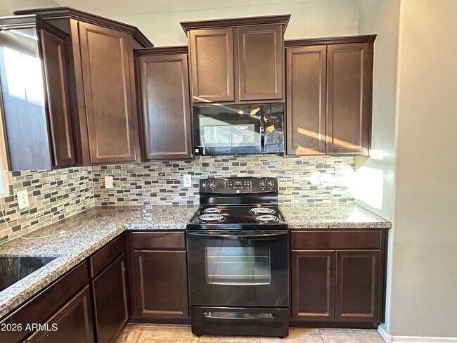 Building Photo - 11741 W Chase Ln