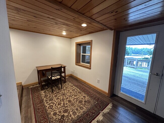 Building Photo - Peaceful Waterfront Living: 2-Story Home on River Road with Ample Outdoor Storage & Water Extras!