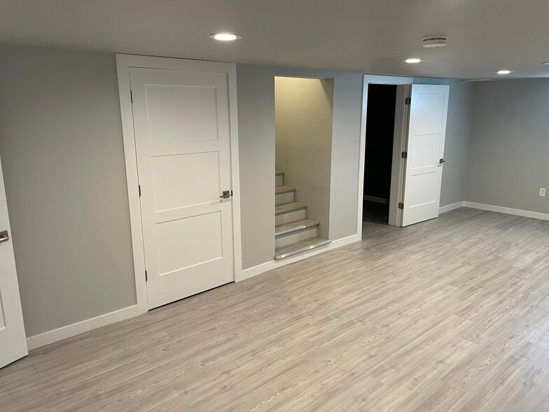 Downstairs Living Room 2 - 3011 N Stout Rd