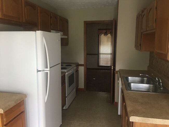 Building Photo - 6886 Kingsgate Dr