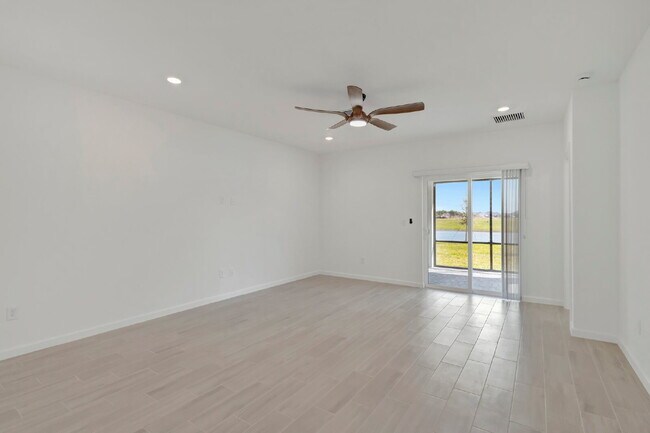 Building Photo - Luxurious Living: Spacious 5-Bedroom Home with Scenic Views in Port Saint Lucie!