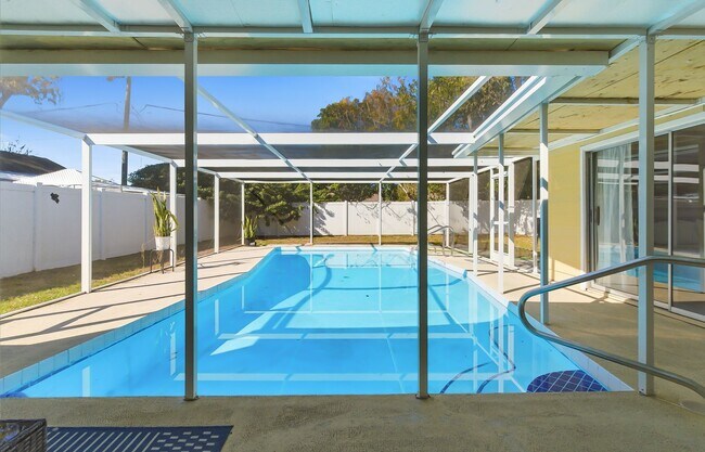 Building Photo - Charming Sarasota Retreat –4-Bedroom/3-Bathroom Modern Pool Home Near Everything!