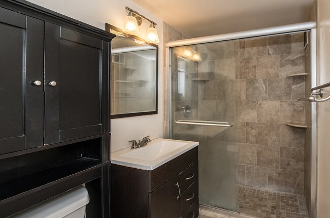 Building Photo - Bright fifth-floor one-bedroom in the heart of Dupont Circle with floor-to-ceiling windows and an...