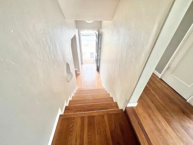 view from top of stairs to foyer - 1390 Dwight Way