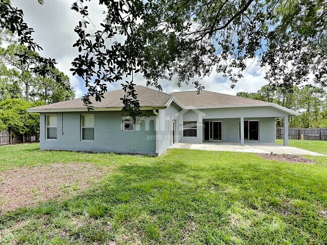 Building Photo - 5940 NW Foust Cir