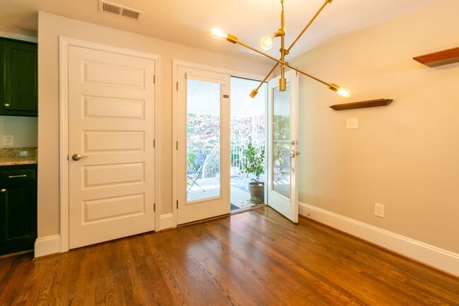 Building Photo - **Application pending 5/1/2026**Stunning Carrboro Condo available early June!
