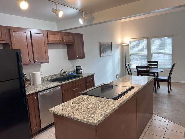Building Photo - FULLY FURNISHED + ALL UTILITIES INCLUDED!