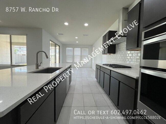 Building Photo - 8757 W Rancho Dr