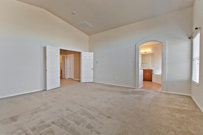 Building Photo - THIS 2 STORY HOME IN A GATED COMMUNITY HAS...