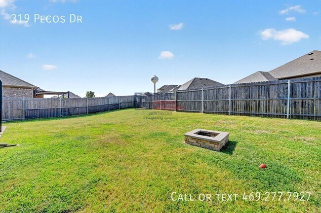 Building Photo - 319 Pecos Dr
