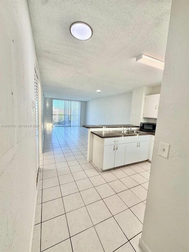 Building Photo - 8750 N Sherman Cir