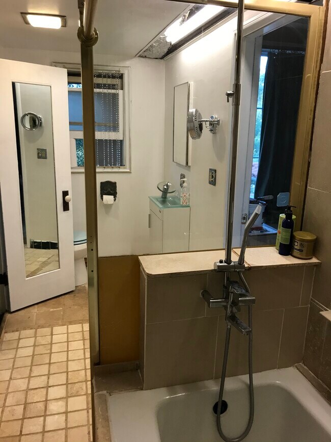 Bathroom door to Bedroom (left) to Living Room (right) - 7964 Glenties Ln